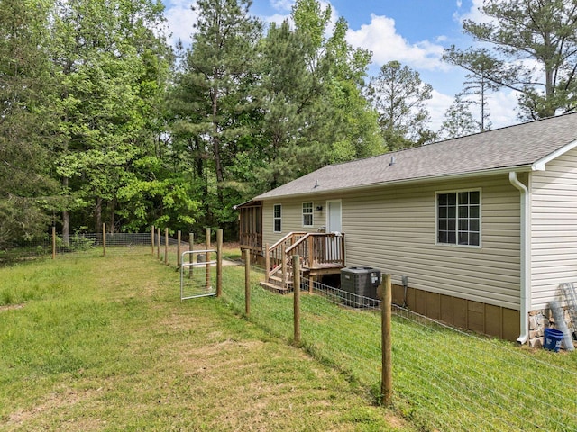 250 E Blackstock, Enoree, SC 29335 - back of property with central AC unit and a shingled roof