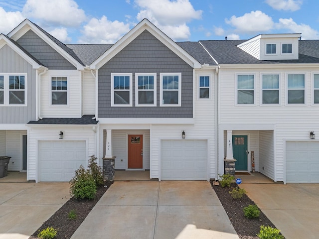 421 Hazelcote, Greenville, SC 29617 - multi unit property with driveway, roof with shingles, and an attached garage