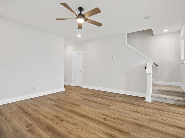 421 Hazelcote, Greenville, SC 29617 - unfurnished living room with ceiling fan, stairs, baseboards, recessed lighting, and light wood-style flooring