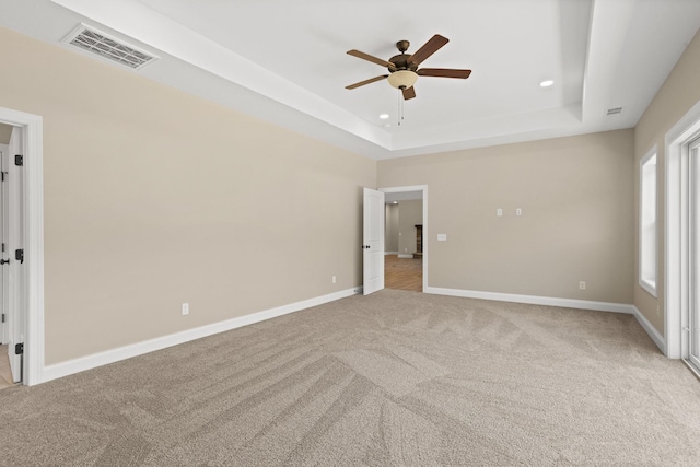 21 Old, American, Pendleton, SC 29670 - unfurnished bedroom featuring a raised ceiling, light colored carpet, recessed lighting, baseboards, and ceiling fan