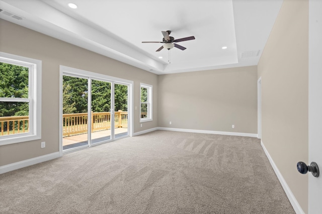 21 Old, American, Pendleton, SC 29670 - spare room with a ceiling fan, carpet, recessed lighting, baseboards, and a tray ceiling