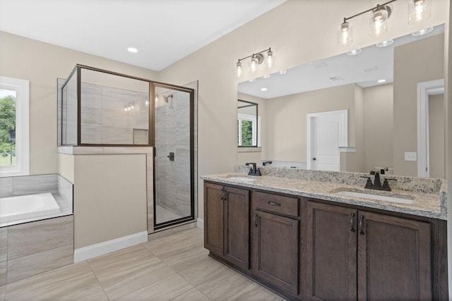 21 Old, American, Pendleton, SC 29670 - bathroom featuring a shower stall, a garden tub, double vanity, and tile patterned floors