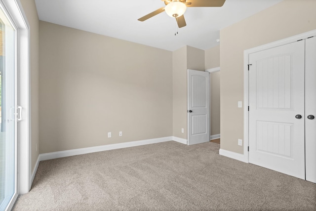 21 Old, American, Pendleton, SC 29670 - unfurnished bedroom featuring carpet floors, baseboards, a closet, and a ceiling fan