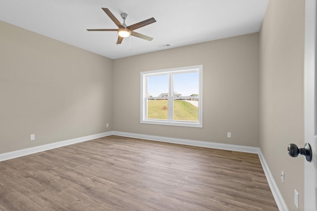 21 Old, American, Pendleton, SC 29670 - spare room featuring ceiling fan, wood finished floors, and baseboards