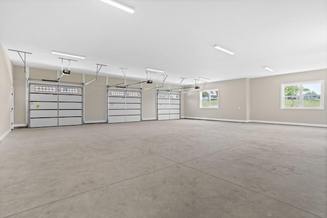 21 Old, American, Pendleton, SC 29670 - garage featuring a garage door opener and baseboards