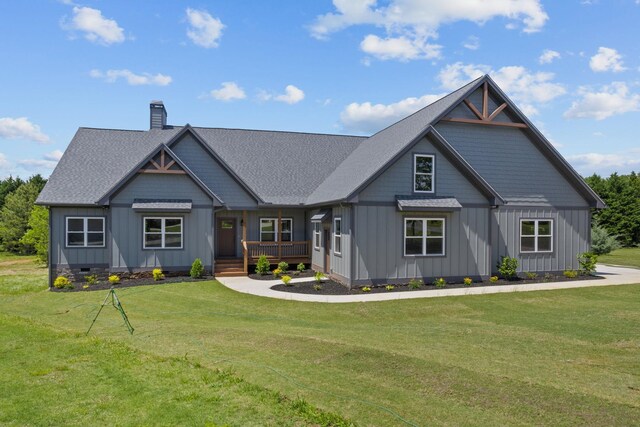 21 Old, American, Pendleton, SC 29670 - view of front of house with a front lawn, a chimney, board and batten siding, covered porch, and crawl space