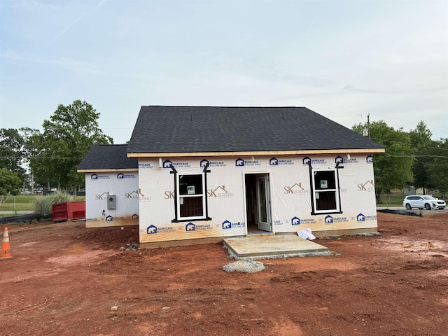 261 Woodgate, Cowpens, SC 29330 - back of house featuring roof with shingles
