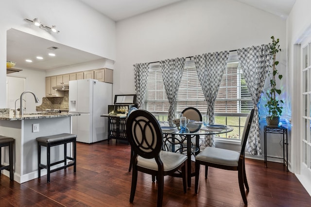 413 Rambling Rose, Moore, SC 29369 - dining room with dark wood-type flooring and high vaulted ceiling