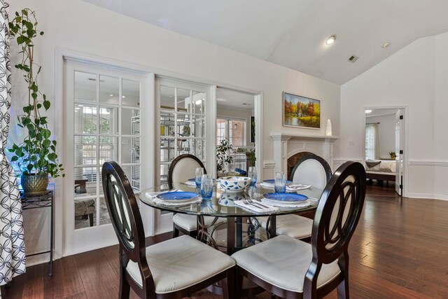 413 Rambling Rose, Moore, SC 29369 - dining space with vaulted ceiling, plenty of natural light, wood finished floors, a fireplace, and baseboards
