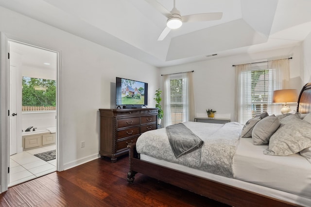 413 Rambling Rose, Moore, SC 29369 - bedroom with dark wood finished floors, a raised ceiling, baseboards, ensuite bathroom, and ceiling fan