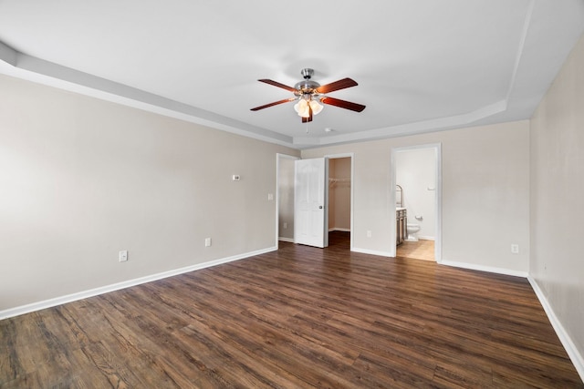 325 Victory, Moore, SC 29369 - spare room with ceiling fan, baseboards, dark wood finished floors, and a raised ceiling