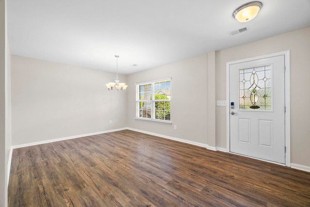 325 Victory, Moore, SC 29369 - foyer featuring a chandelier, dark wood-type flooring, and baseboards
