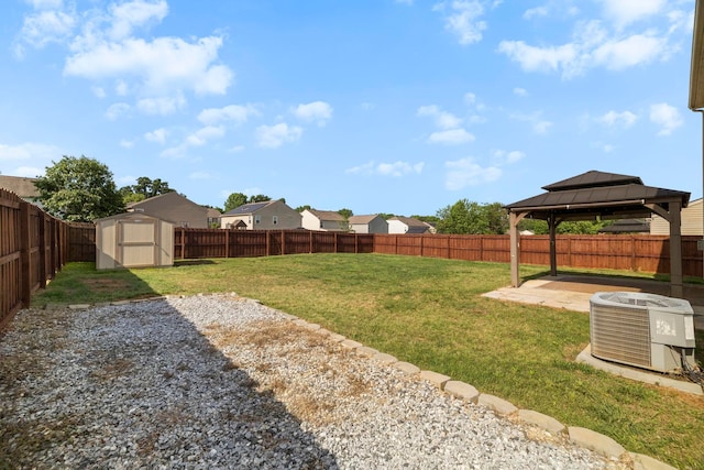 325 Victory, Moore, SC 29369 - view of yard featuring central AC, a shed, a gazebo, an outbuilding, and a patio