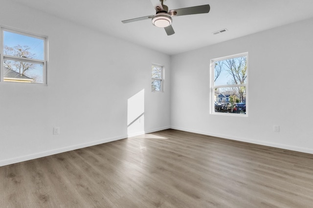 514 N Forest, Spartanburg, SC 29303 - unfurnished room featuring wood finished floors, a ceiling fan, and baseboards