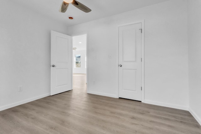 514 N Forest, Spartanburg, SC 29303 - unfurnished bedroom with light wood finished floors, baseboards, and ceiling fan