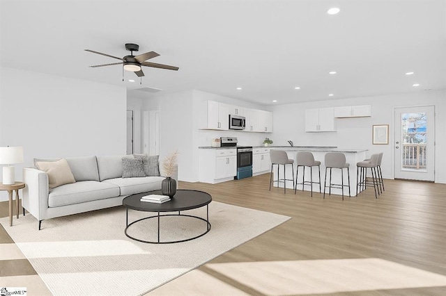 514 N Forest, Spartanburg, SC 29303 - living room with recessed lighting, light wood-style floors, and ceiling fan