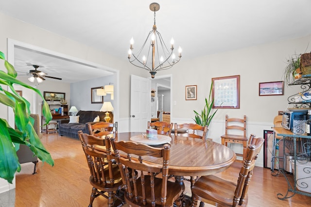302 Peach Vly, Spartanburg, SC 29303 - dining area with light wood finished floors, a chandelier, and a ceiling fan
