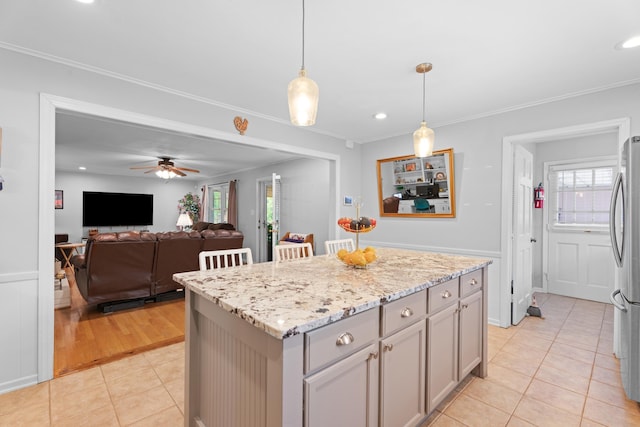 302 Peach Vly, Spartanburg, SC 29303 - kitchen featuring plenty of natural light, light tile patterned floors, hanging light fixtures, a ceiling fan, and recessed lighting