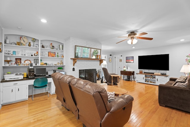 302 Peach Vly, Spartanburg, SC 29303 - living room featuring a ceiling fan, a brick fireplace, light wood-style flooring, and recessed lighting