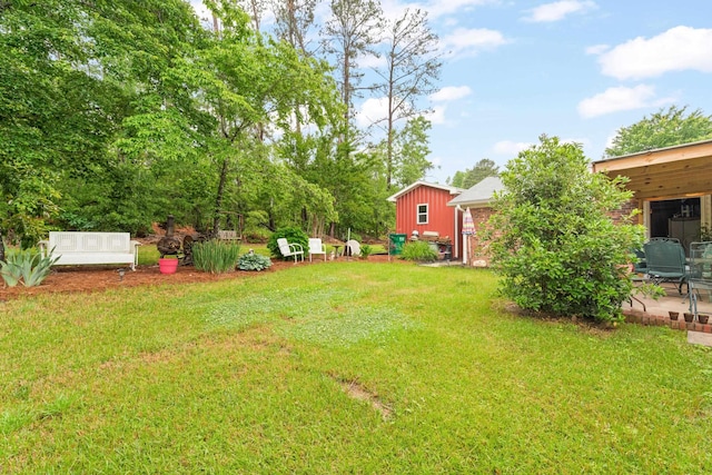 302 Peach Vly, Spartanburg, SC 29303 - view of grassy yard with a patio