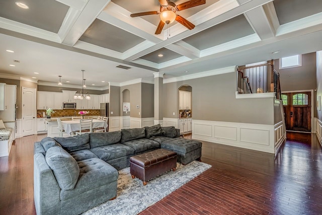 112 Murdock, Greer, SC 29651 - living room with arched walkways, a ceiling fan, hardwood / wood-style flooring, ornamental molding, and beamed ceiling