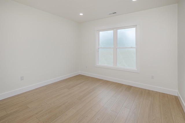 123 Stribling, Spartanburg, SC 29301 - unfurnished room with baseboards, light wood-style flooring, and recessed lighting