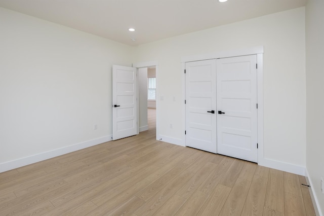 123 Stribling, Spartanburg, SC 29301 - unfurnished bedroom featuring light wood-type flooring, baseboards, recessed lighting, and a closet