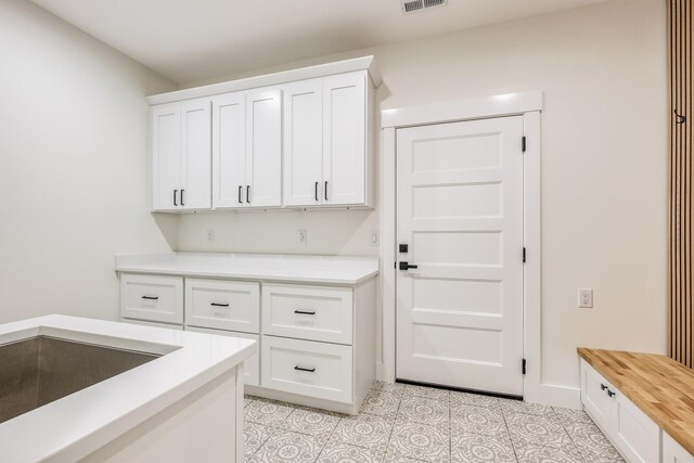 123 Stribling, Spartanburg, SC 29301 - laundry area with light tile patterned floors