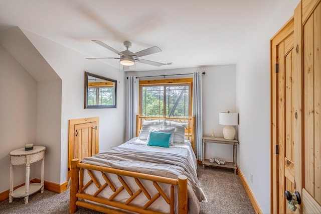 bedroom with carpet, baseboards, and a ceiling fan