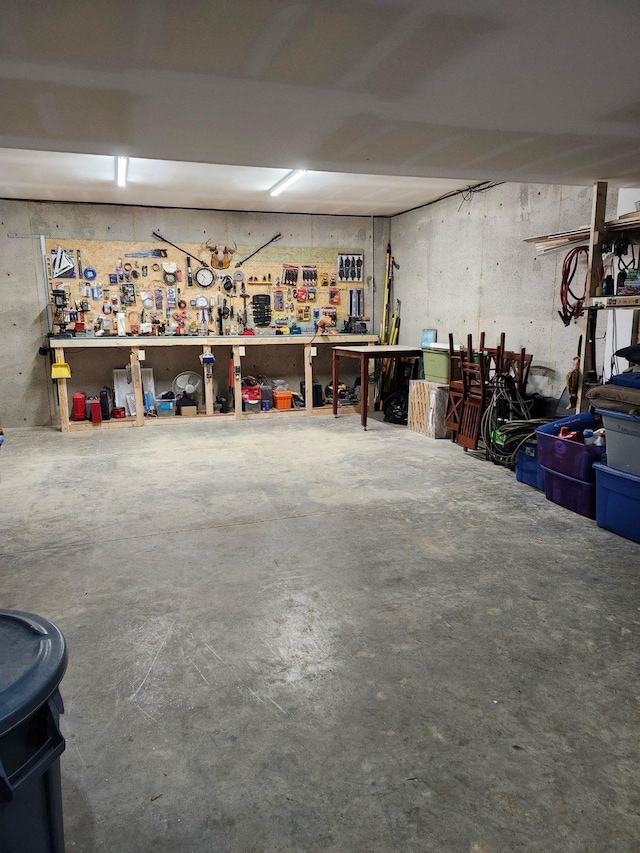 garage with a workshop area