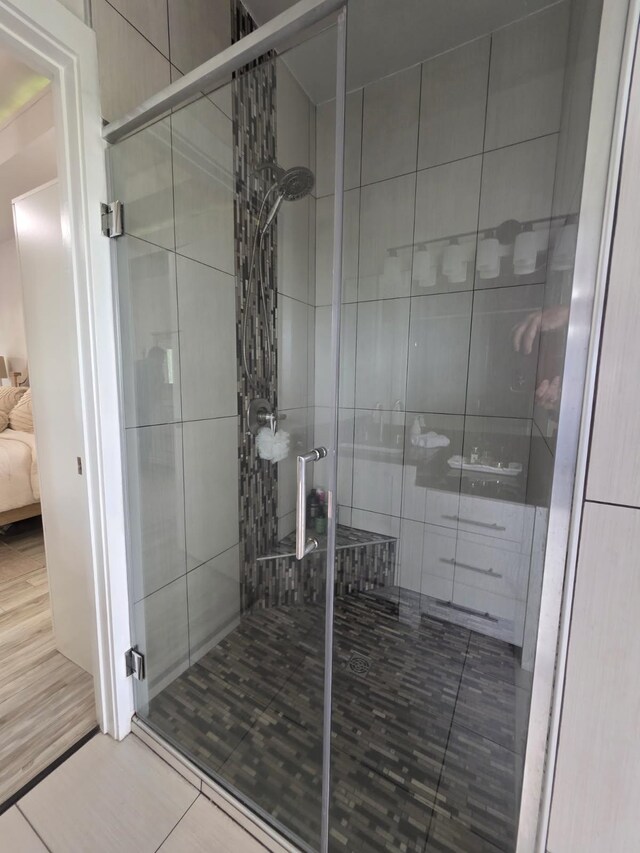 473 Meadow Rd, Inman, SC 29349 - ensuite bathroom featuring a stall shower and tile patterned flooring