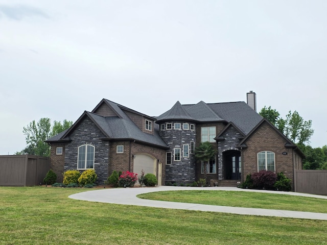 473 Meadow Rd, Inman, SC 29349 - french country inspired facade featuring a chimney, stone siding, brick siding, a garage, and concrete driveway