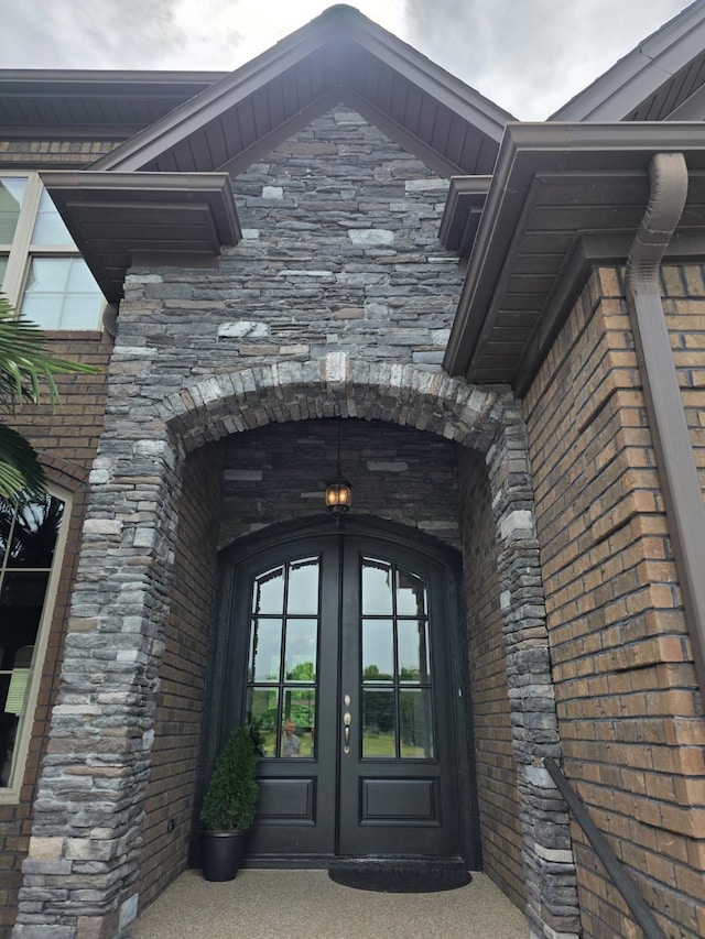 473 Meadow Rd, Inman, SC 29349 - property entrance featuring french doors, stone siding, and brick siding