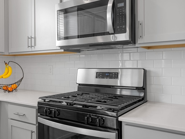 7007 Manse, Boiling Springs, SC 29316 - kitchen featuring stainless steel appliances, backsplash, and light countertops