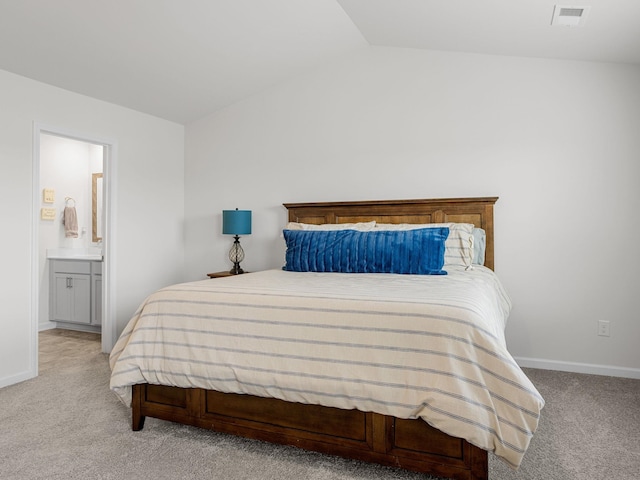 7007 Manse, Boiling Springs, SC 29316 - bedroom with light carpet, baseboards, lofted ceiling, and ensuite bathroom
