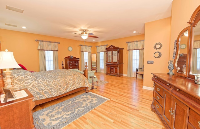 bedroom featuring light wood-type flooring, baseboards, recessed lighting, and ceiling fan