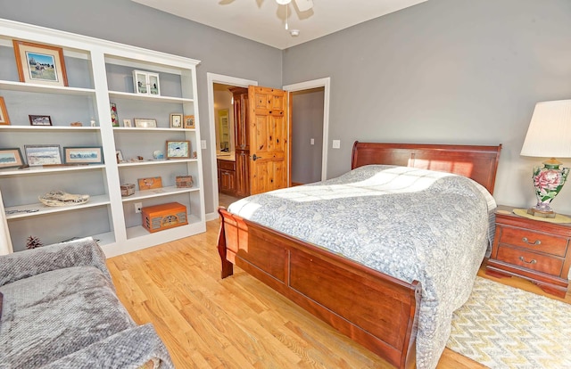 bedroom with light wood finished floors and ceiling fan