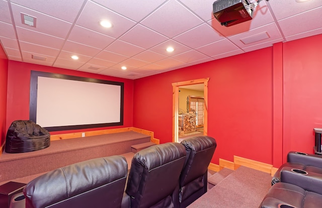home theater featuring recessed lighting and a paneled ceiling