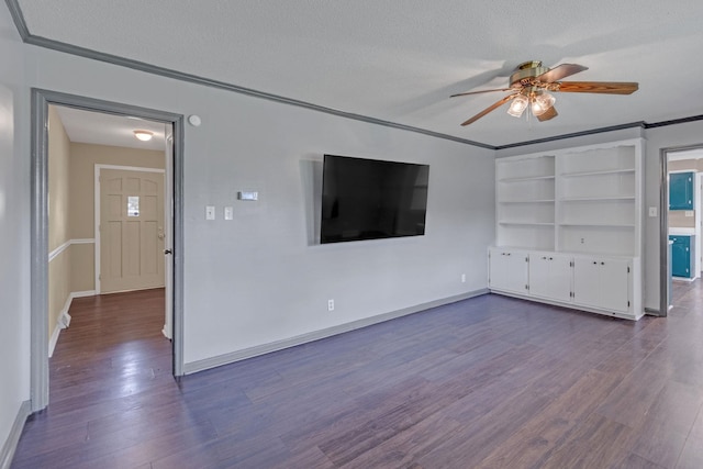unfurnished living room featuring ceiling fan, dark wood-type flooring, crown molding, a textured ceiling, and baseboards
