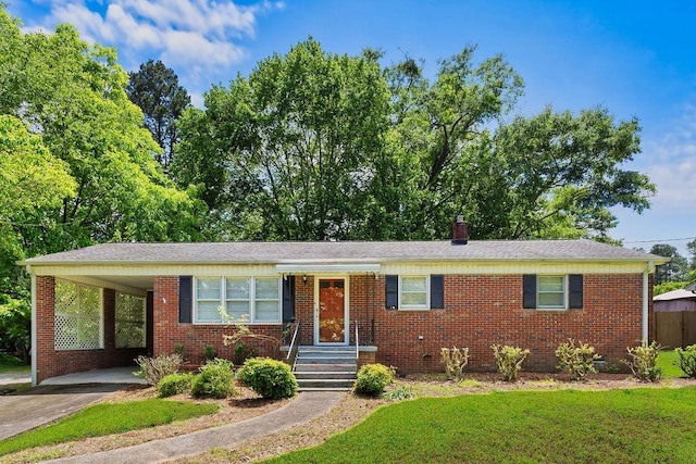 208 Catawba, Union, SC 29379 - ranch-style house featuring brick siding, concrete driveway, and a front yard