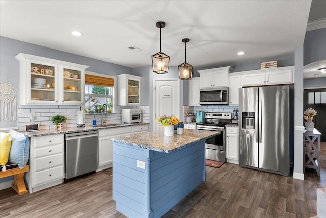 1101 Rosabella, Greer, SC 29651 - kitchen with appliances with stainless steel finishes, a sink, decorative backsplash, white cabinets, and recessed lighting