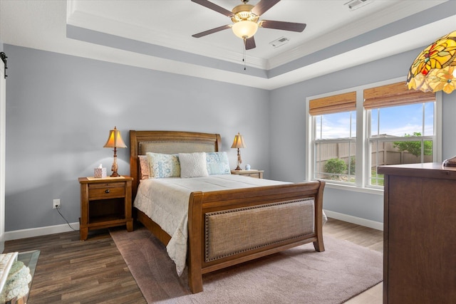 1101 Rosabella, Greer, SC 29651 - bedroom with crown molding, a raised ceiling, baseboards, wood finished floors, and a ceiling fan
