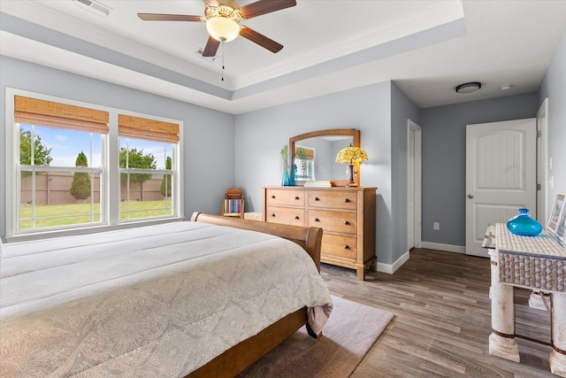 1101 Rosabella, Greer, SC 29651 - bedroom featuring wood finished floors, a raised ceiling, baseboards, ornamental molding, and a ceiling fan