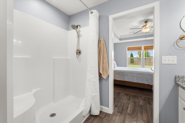 1101 Rosabella, Greer, SC 29651 - bathroom featuring wood finished floors, ensuite bathroom, a ceiling fan, and a shower with shower curtain