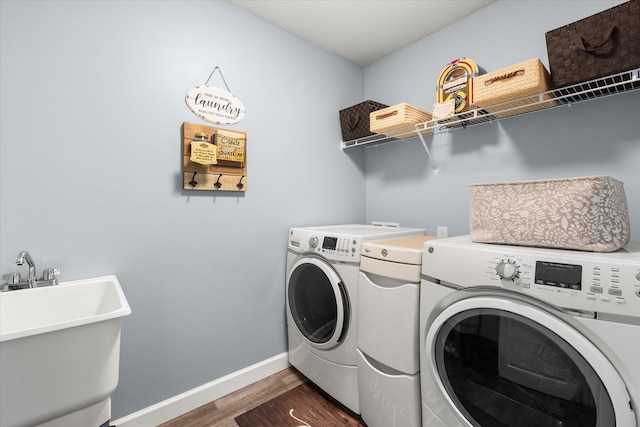 1101 Rosabella, Greer, SC 29651 - washroom featuring washer and dryer, dark wood finished floors, and baseboards