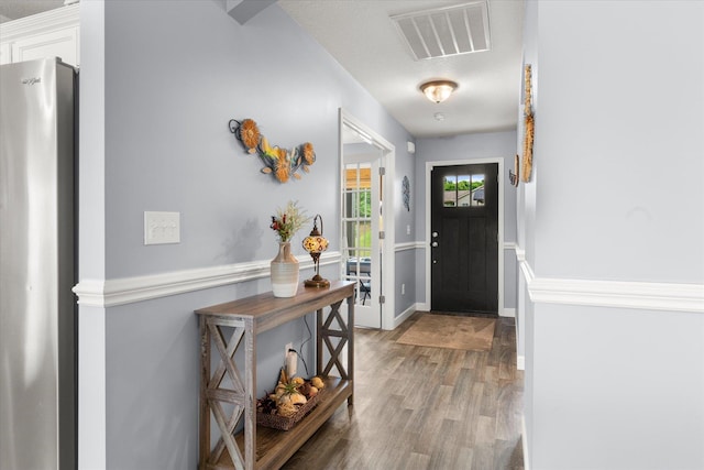 1101 Rosabella, Greer, SC 29651 - entryway with light wood-type flooring and a textured ceiling