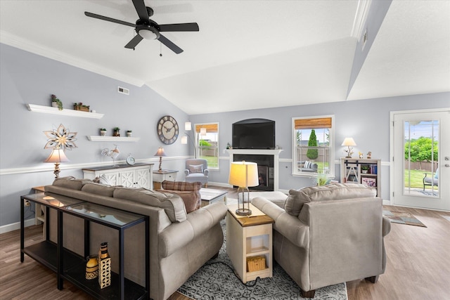 1101 Rosabella, Greer, SC 29651 - living area with light wood-type flooring, ceiling fan, plenty of natural light, a fireplace, and vaulted ceiling