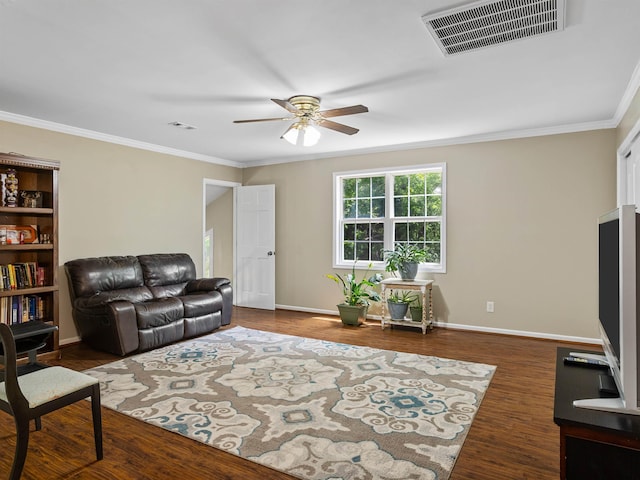 112 Scruggs, Gaffney, SC 29341 - living room with ceiling fan, baseboards, wood finished floors, and ornamental molding