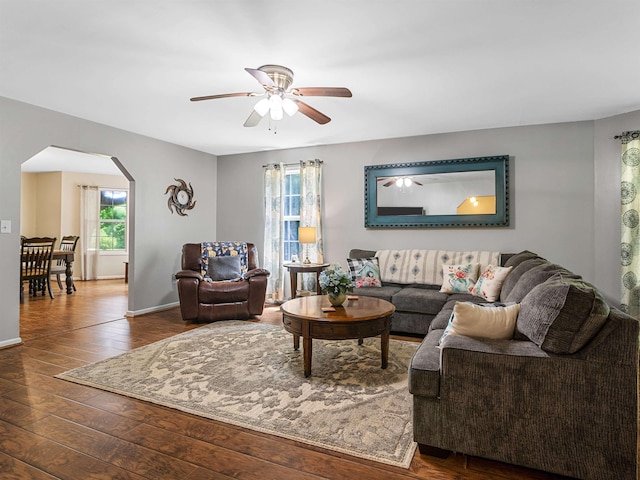 112 Scruggs, Gaffney, SC 29341 - living room featuring arched walkways, plenty of natural light, ceiling fan, and baseboards