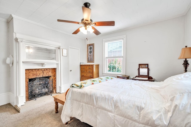 114 Martin, Laurens, SC 29360 - bedroom featuring ornamental molding, carpet flooring, a fireplace with raised hearth, and a ceiling fan